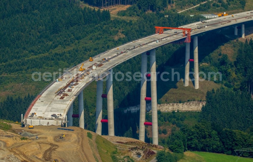 Bestwig from the bird's eye view: Routing and traffic lanes over the new building of the highway bridge in the motorway A46 in Bestwig in the state North Rhine-Westphalia