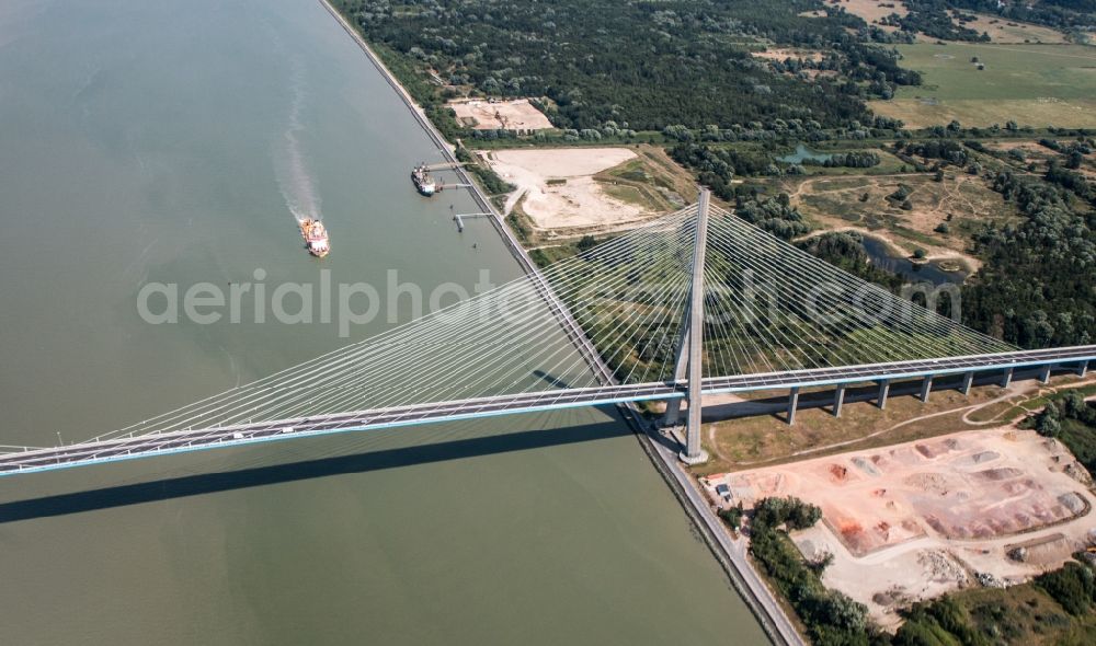 Honfleur from above - Routing and traffic lanes over the highway bridge in the motorway A29 Le Pont de Normandie in Honfleur in Normandie, France