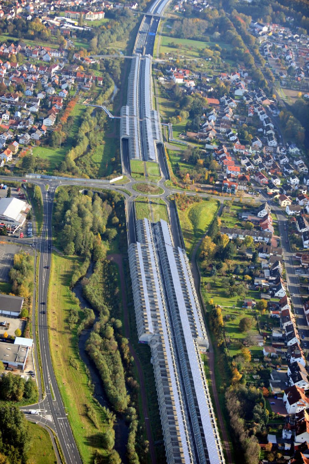 Goldbach from above - Die längste Photovoltaikanlage / Solaranlage der Welt befindet sich auf dem Dach der Autobahn-Einhausung der A 3 bei Aschaffenburg in Baden-Württemberg. Betreiber ist das Elektrizitätswerk Goldbach Hösbach. The world longest photovoltaic power plant / solar power system of the freeway E 41 is on the roof of the Motorway-enclosure near Aschaffenburg in Baden-Wuerttemberg.