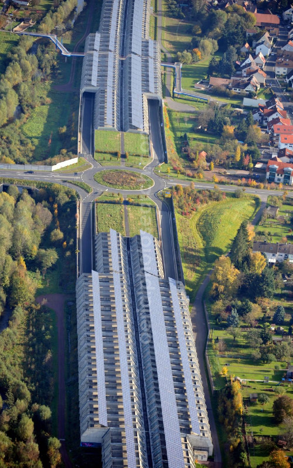 Aerial image Goldbach - Die längste Photovoltaikanlage / Solaranlage der Welt befindet sich auf dem Dach der Autobahn-Einhausung der A 3 bei Aschaffenburg in Baden-Württemberg. Betreiber ist das Elektrizitätswerk Goldbach Hösbach. The world longest photovoltaic power plant / solar power system of the freeway E 41 is on the roof of the Motorway-enclosure near Aschaffenburg in Baden-Wuerttemberg.