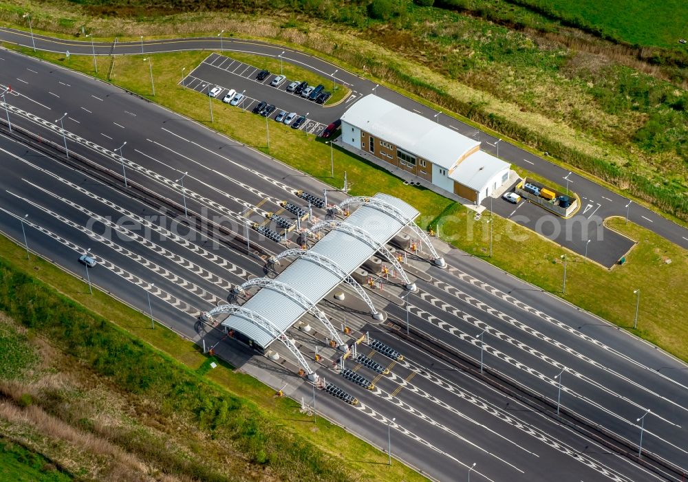 Aerial image Limerick - Highway toll station and paying agent of the N18 before Shannon Tunnel in Limerick, Ireland