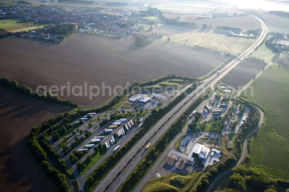 Aerial photograph Kirchworbis - Routing and traffic lanes during the motorway service station and parking lot of the BAB A 38 in Kirchworbis in the state Thuringia, Germany