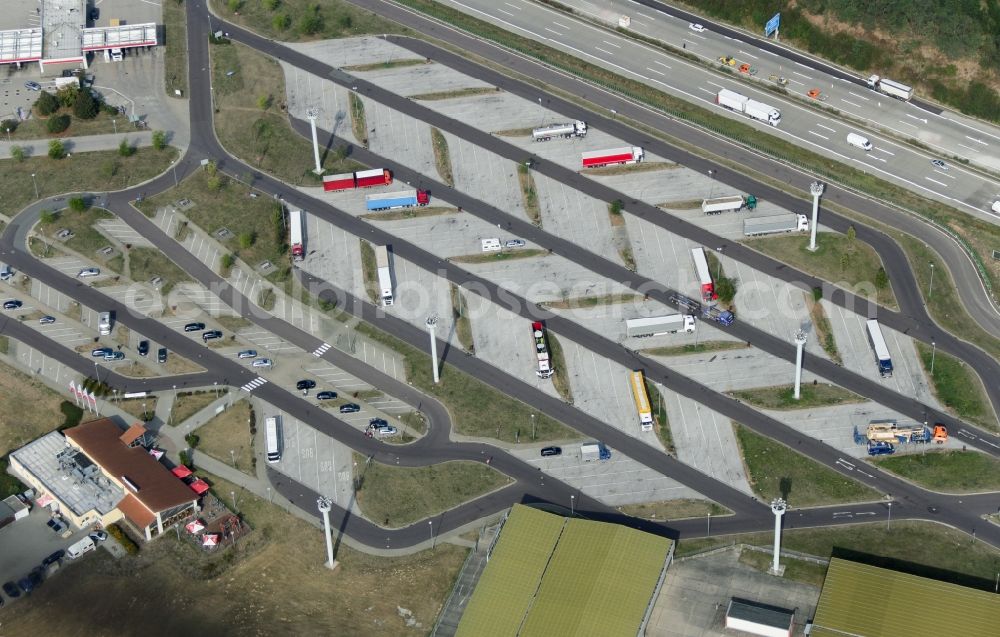 Marienborn from the bird's eye view: Routing and traffic lanes during the motorway service station and parking lot of the BAB A 2 in Marienborn in the state Saxony-Anhalt