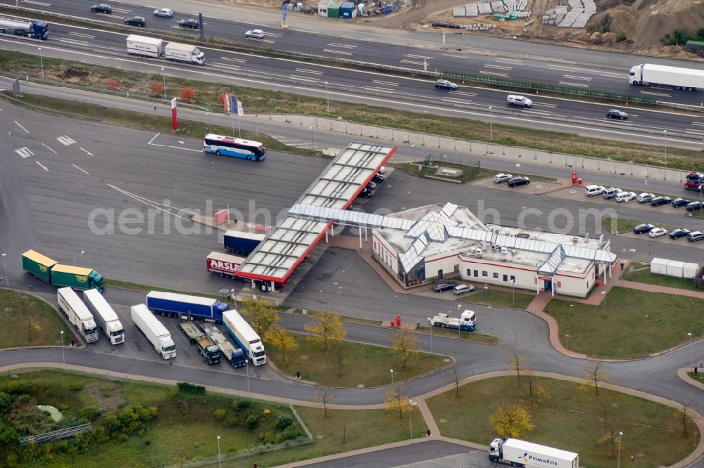 Michendorf from above - Routing and traffic lanes during the motorway service station and parking lot of the BAB A10 Michendorf in Michendorf in the state Brandenburg