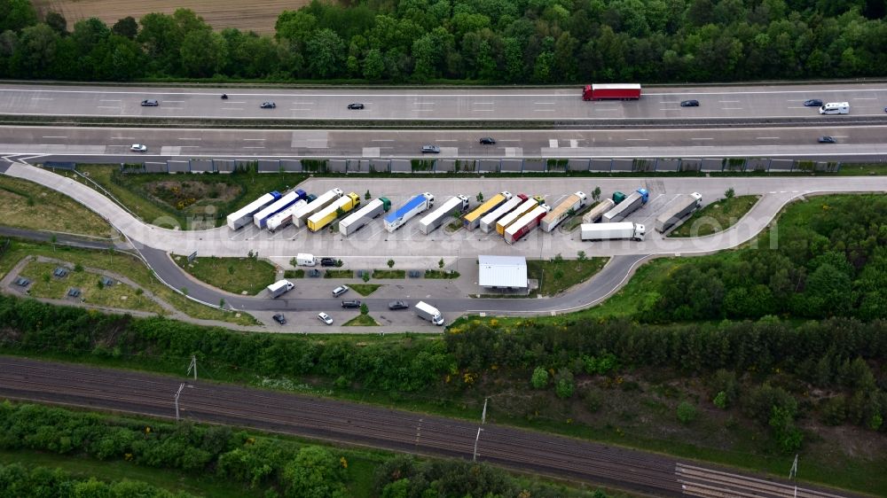 Neustadt (Wied) from the bird's eye view: Lorries - parking spaces at the highway rest stop and parking of the BAB A 3 in Neustadt (Wied) in the state Rhineland-Palatinate, Germany