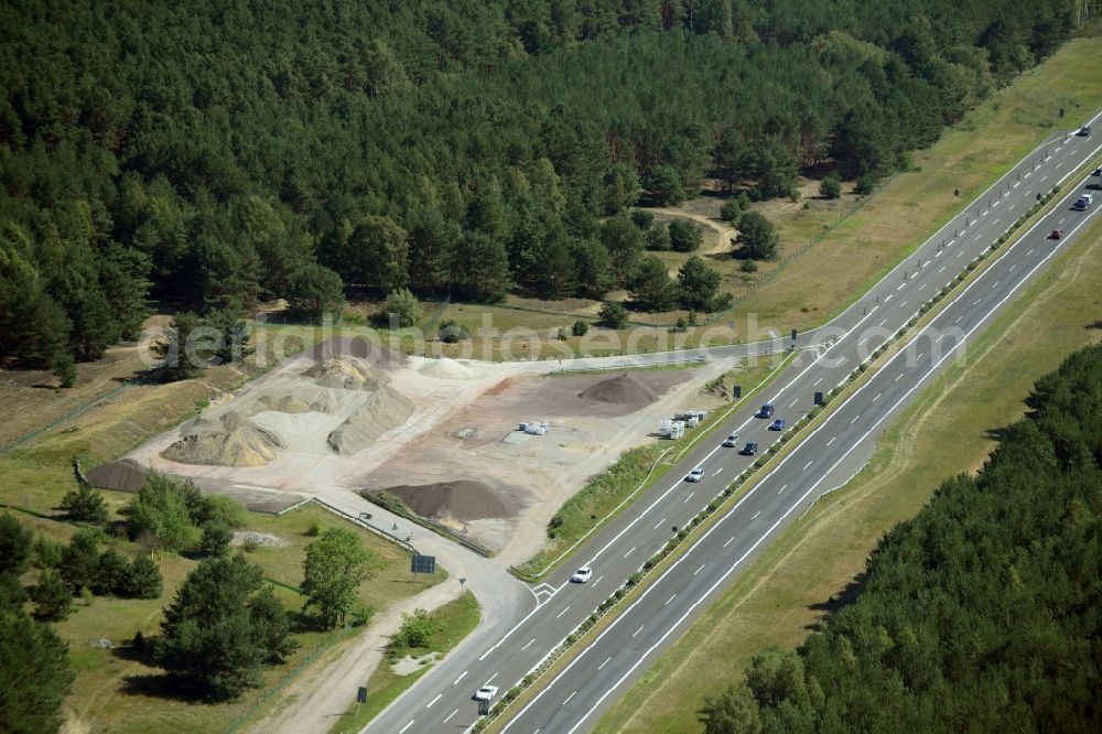 Spreenhagen from the bird's eye view: Routing and traffic lanes during the motorway service station and parking lot of the BAB A 12 E30 in Spreenhagen in the state Brandenburg