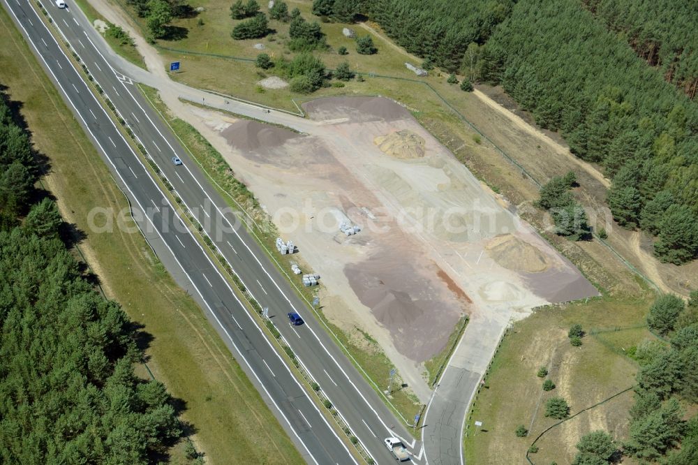 Spreenhagen from above - Routing and traffic lanes during the motorway service station and parking lot of the BAB A 12 E30 in Spreenhagen in the state Brandenburg