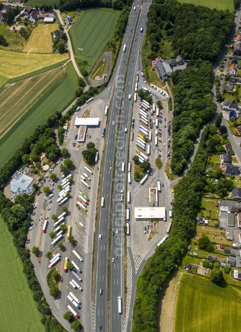 Holzwickede from the bird's eye view: Motorway service area on the edge of the course of BAB highway A1 - E37 in Holzwickede in the state North Rhine-Westphalia