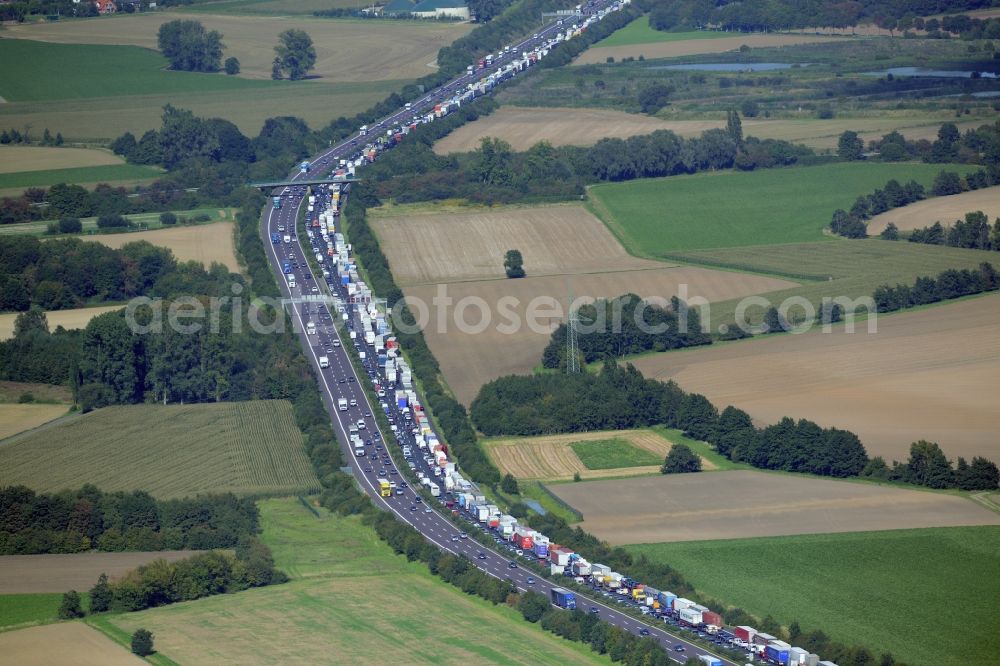 Aerial photograph Bad Nenndorf - Highway congestion along the route of the lanes BAB E30by truck congestion snake in Bad Nenndorf in the state Lower Saxony