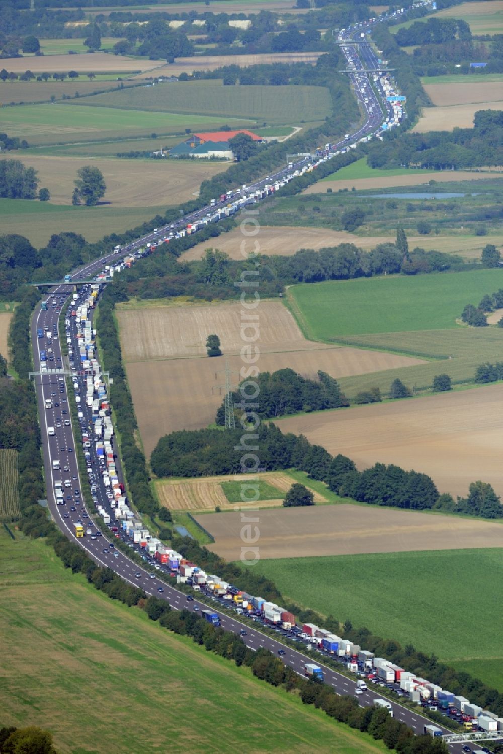 Bad Nenndorf from above - Highway congestion along the route of the lanes BAB E30by truck congestion snake in Bad Nenndorf in the state Lower Saxony