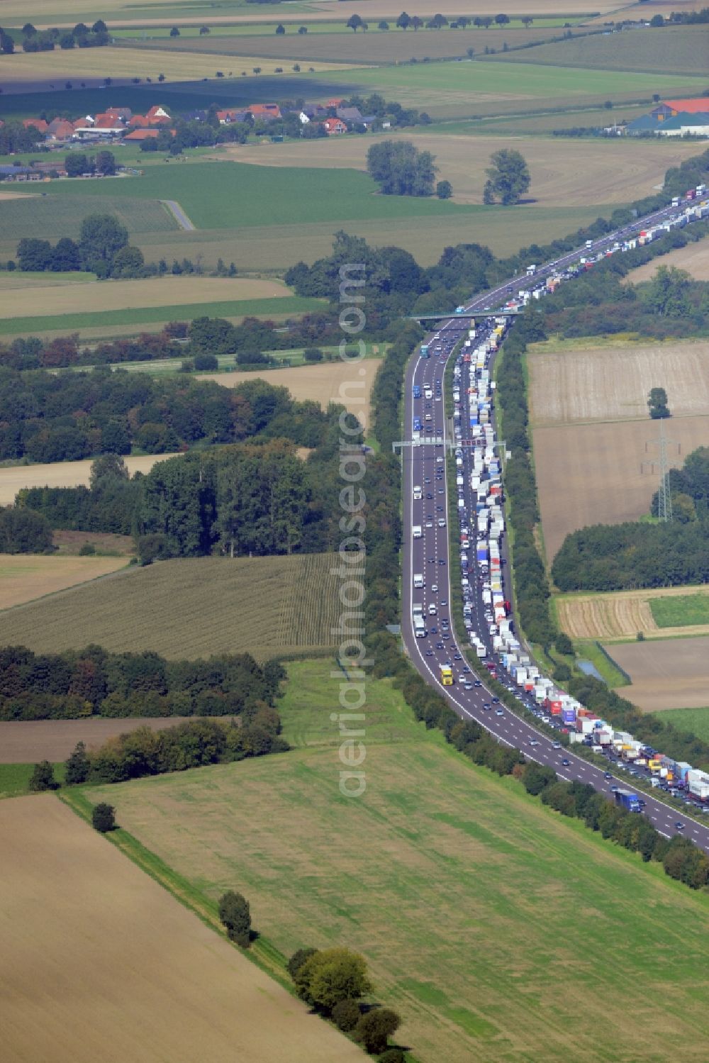 Bad Nenndorf from the bird's eye view: Highway congestion along the route of the lanes BAB E30by truck congestion snake in Bad Nenndorf in the state Lower Saxony