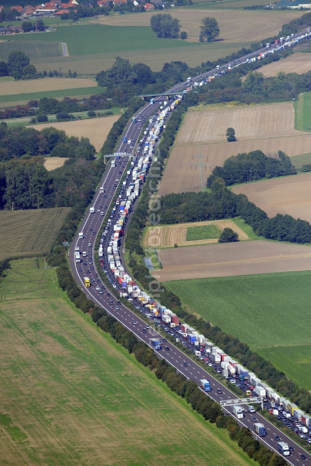 Bad Nenndorf from above - Highway congestion along the route of the lanes BAB E30by truck congestion snake in Bad Nenndorf in the state Lower Saxony