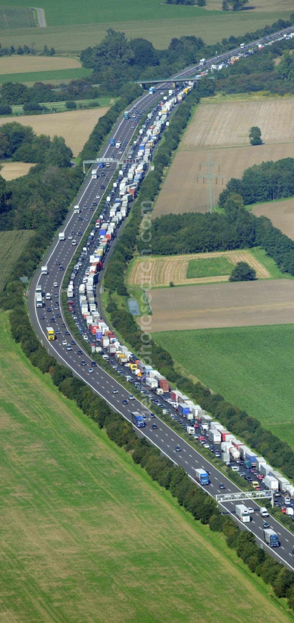 Bad Nenndorf from the bird's eye view: Highway congestion along the route of the lanes BAB E30by truck congestion snake in Bad Nenndorf in the state Lower Saxony