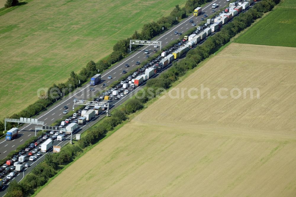 Bad Nenndorf from above - Highway congestion along the route of the lanes BAB E30by truck congestion snake in Bad Nenndorf in the state Lower Saxony