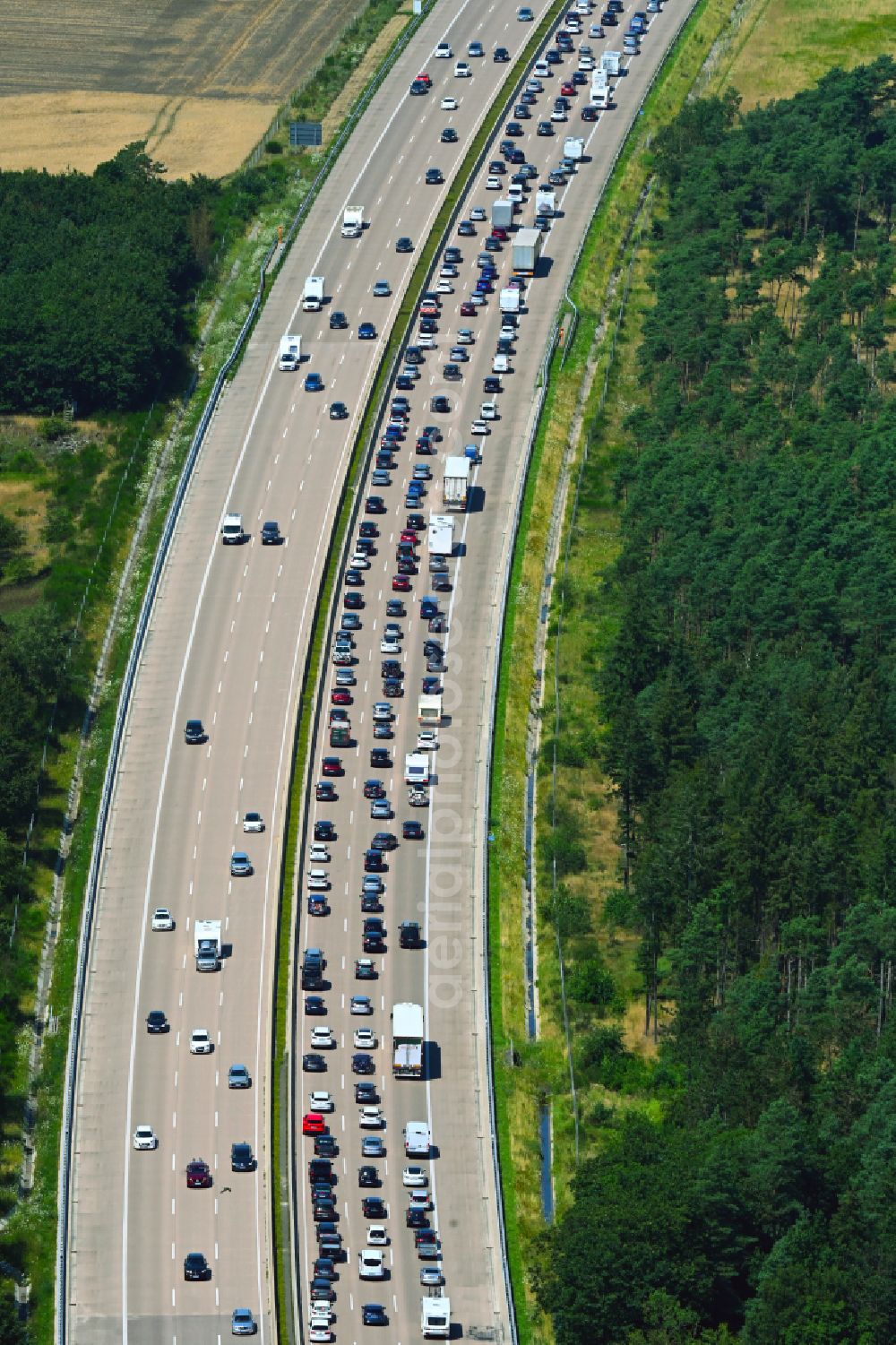 Aerial image Hoheheide - Motorway congestion along the route of the lanes BAB A7 in Hoheheide in the state Lower Saxony, Germany