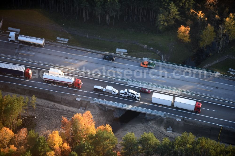 Spreenhagen from the bird's eye view: Highway congestion along the route of the lanes A12 E30 bei laufendem Ausbau und Spurerweiterung in Spreenhagen in the state Brandenburg