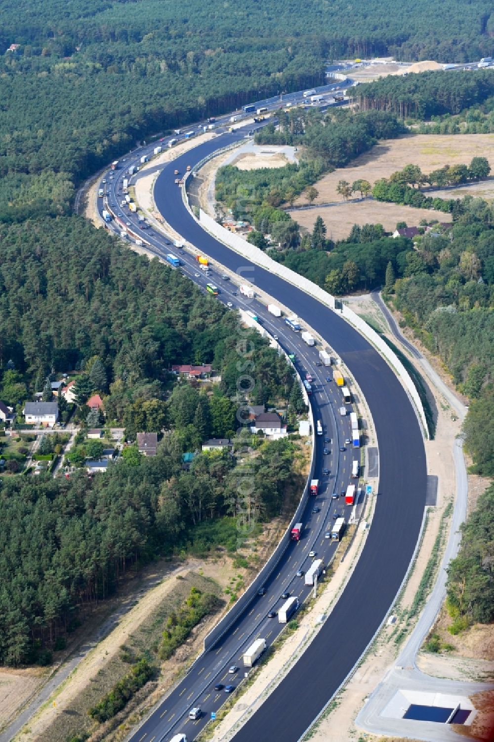 Michendorf from above - Lanes of the motorway- route and course of the A10 in Michendorf in the state Brandenburg, Germany