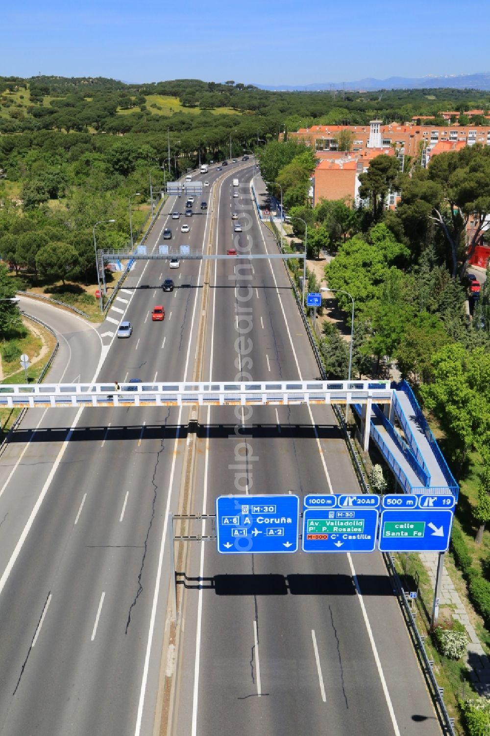 Madrid from above - Lanes of the motorway- route and course of the orbital motorway M30 at the parc Casa di Campo in Madrid in Comunidad de Madrid, Spain