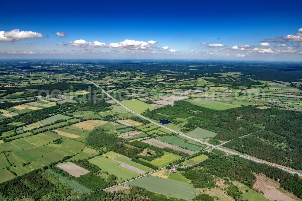 Bimöhlen from the bird's eye view: Traffic lanes during the highway exit and access the motorway A7 in Bimoehlen in the state Schleswig-Holstein, Germany