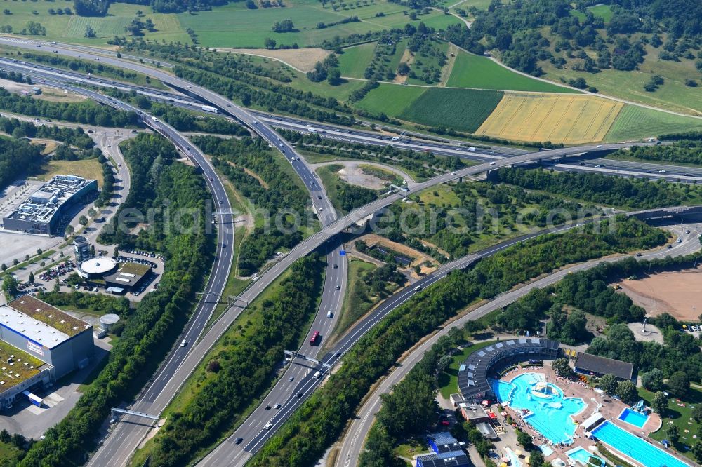 Leonberg from the bird's eye view: Routing and traffic lanes during the highway exit and access the motorway A 8 in Leonberg in the state Baden-Wurttemberg, Germany