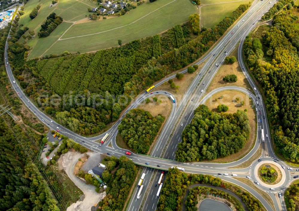 Aerial photograph Wilnsdorf - Routing and traffic lanes during the highway exit and access the motorway A 45 in Wilnsdorf in the state North Rhine-Westphalia, Germany