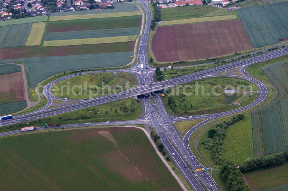 Geldersheim from the bird's eye view: Routing and traffic lanes during the highway exit and access the motorway A 71 to the B303 in Geldersheim in the state Bavaria, Germany