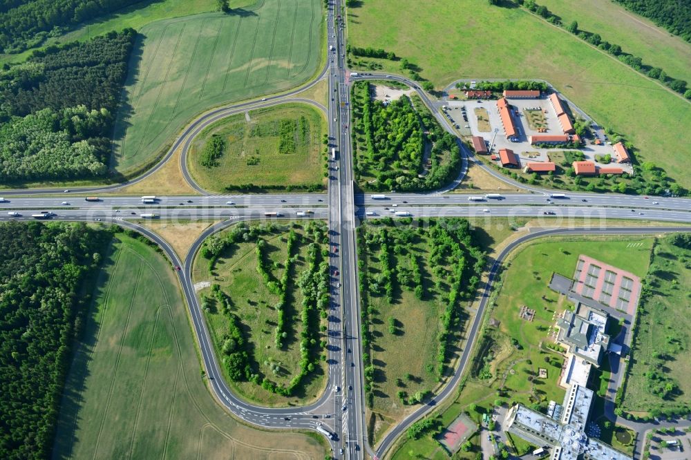 Rangsdorf from the bird's eye view: Motorway exit Rangsdorf on the Berliner Ring motorway A10 - E30 in Rangsdorf in Brandenburg