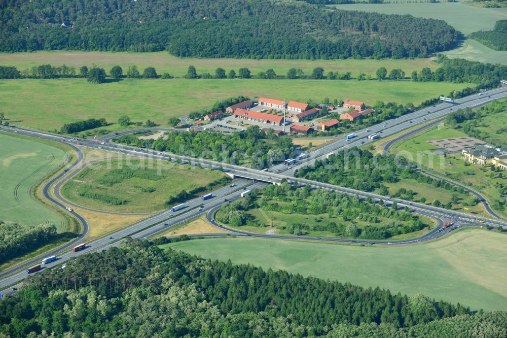 Rangsdorf from the bird's eye view: Motorway exit Rangsdorf on the Berliner Ring motorway A10 - E30 in Rangsdorf in Brandenburg