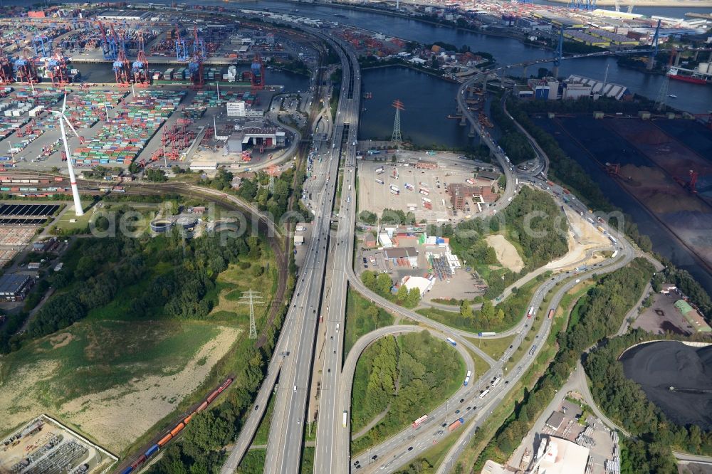 Aerial image Hamburg - Motorway exit slip road A7 HH-Waltershof, the course of curve on the Finkenwerder road and Waltershof customs office in Hamburg-Mitte. A project of the Hamburg Port Authority HPA