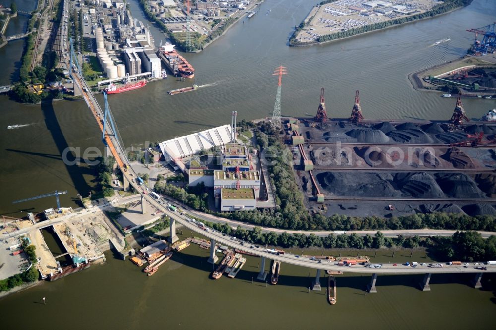 Aerial image Hamburg - Motorway exit slip road A7 HH-Waltershof, the course of curve on the Finkenwerder road and Waltershof customs office in Hamburg-Mitte. A project of the Hamburg Port Authority HPA