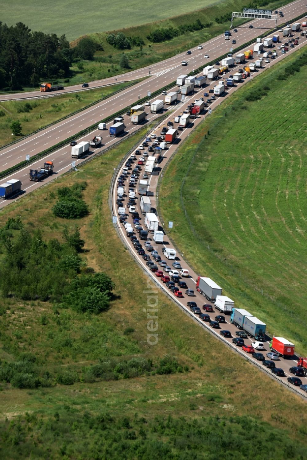 Nuthetal from above - Highway triangular departure of AD the BAB A10 - A115 with itself tightly marveling road with truck traffic in Nuthetal in Brandenburg. Operator is the country operating Strassenwesen Brandenburg