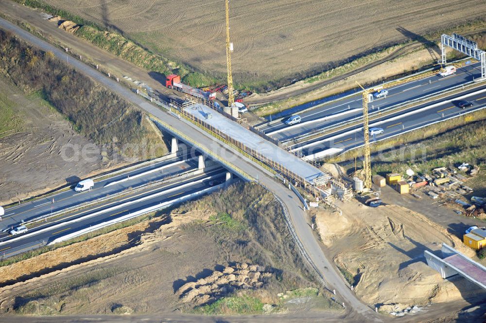 SCHWANEBECK from above - Baustelle vom Autobahndreieck Kreuz Barnim, vormals AD Schwanebeck, mit Aus- und Umbauarbeiten. Die EUROVIA führt im Auftrag des Landesbetrieb Brandenburg umfangreiche Abbruch-, Erdarbeiten und den Neubau von Brückenbauwerken zum Um- und Ausbau des Autobahndreiecks (AD) Barnim am nördlichen Berliner Ring durch. View of the construction site at the highway triangle Kreuz Barnim.