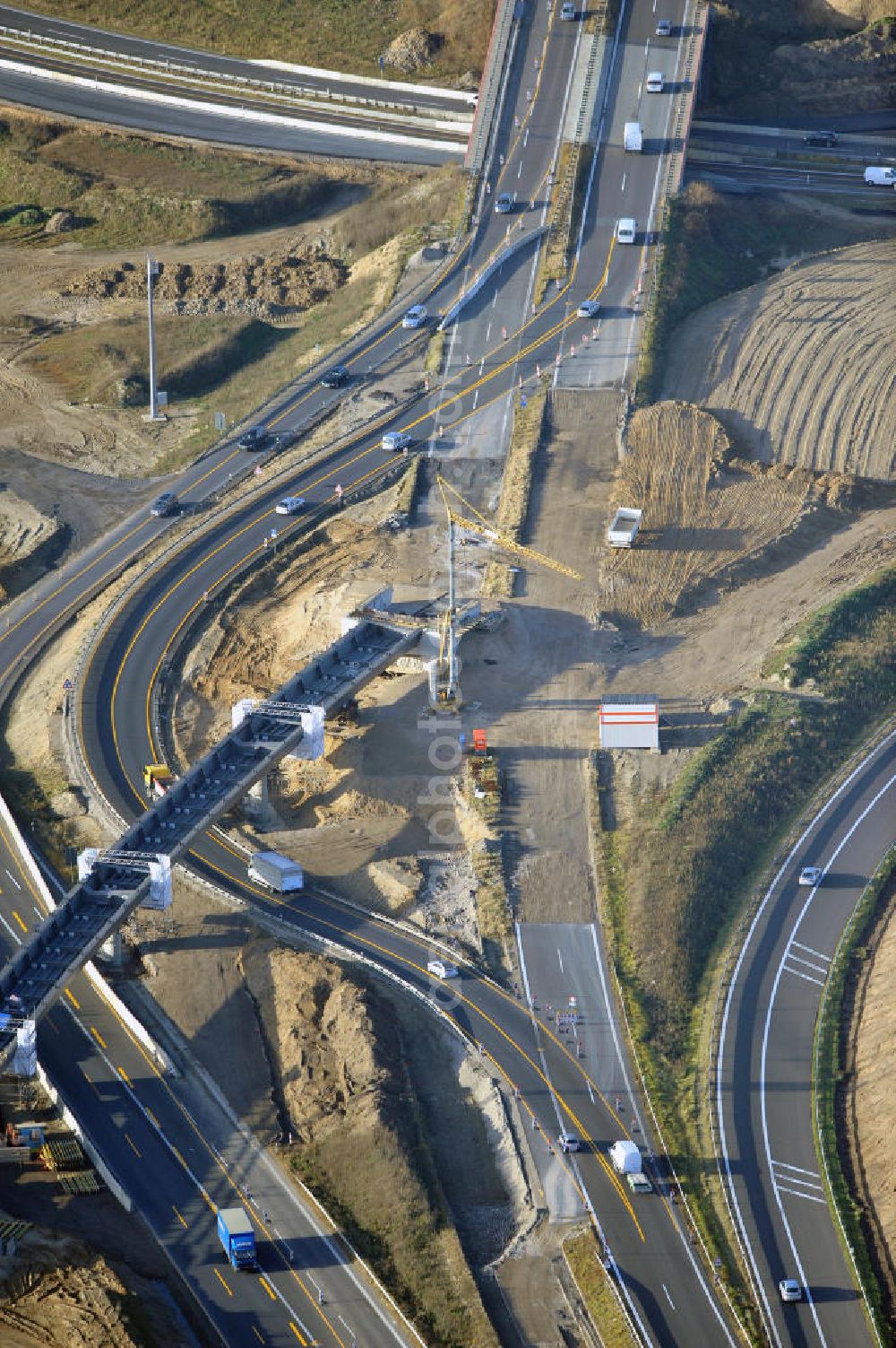 SCHWANEBECK from the bird's eye view: Baustelle vom Autobahndreieck Kreuz Barnim, vormals AD Schwanebeck, mit Aus- und Umbauarbeiten. Die EUROVIA führt im Auftrag des Landesbetrieb Brandenburg umfangreiche Abbruch-, Erdarbeiten und den Neubau von Brückenbauwerken zum Um- und Ausbau des Autobahndreiecks (AD) Barnim am nördlichen Berliner Ring durch. View of the construction site at the highway triangle Kreuz Barnim.