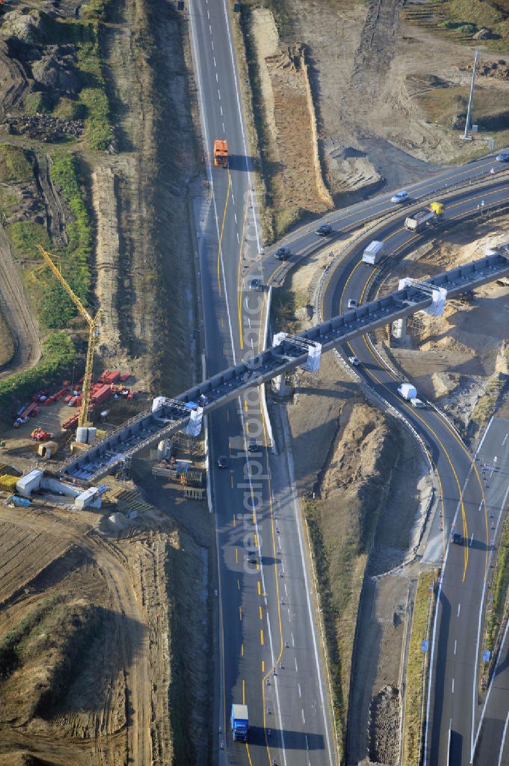 Aerial image SCHWANEBECK - Baustelle vom Autobahndreieck Kreuz Barnim, vormals AD Schwanebeck, mit Aus- und Umbauarbeiten. Die EUROVIA führt im Auftrag des Landesbetrieb Brandenburg umfangreiche Abbruch-, Erdarbeiten und den Neubau von Brückenbauwerken zum Um- und Ausbau des Autobahndreiecks (AD) Barnim am nördlichen Berliner Ring durch. View of the construction site at the highway triangle Kreuz Barnim.