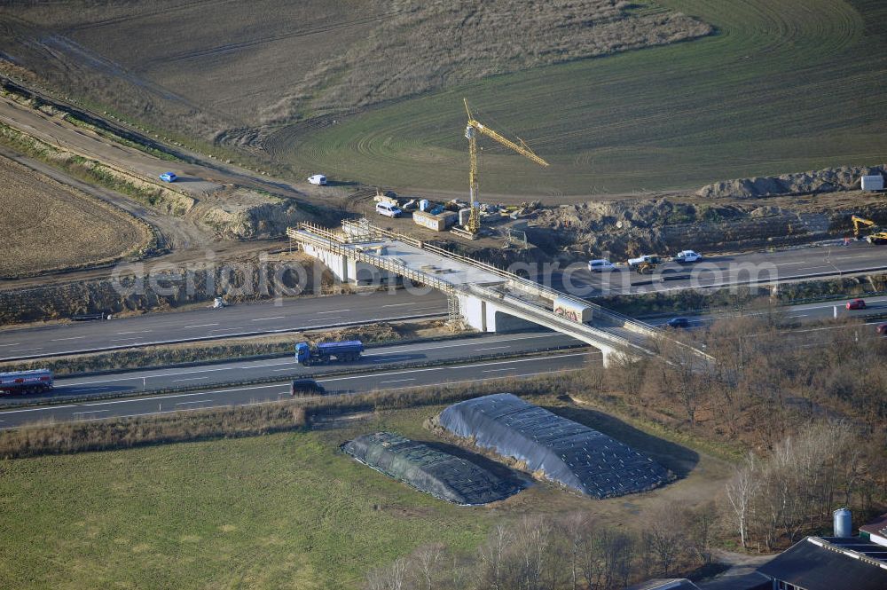 Aerial photograph SCHWANEBECK - Baustelle vom Autobahndreieck Kreuz Barnim, vormals AD Schwanebeck, mit Aus- und Umbauarbeiten. Die EUROVIA führt im Auftrag des Landesbetrieb Brandenburg umfangreiche Abbruch-, Erdarbeiten und den Neubau von Brückenbauwerken zum Um- und Ausbau des Autobahndreiecks (AD) Barnim am nördlichen Berliner Ring durch. View of the construction site at the highway triangle Kreuz Barnim.