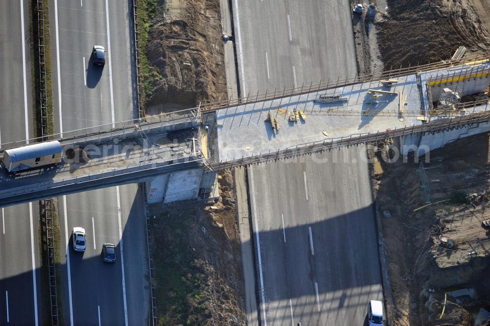 SCHWANEBECK from the bird's eye view: Baustelle vom Autobahndreieck Kreuz Barnim, vormals AD Schwanebeck, mit Aus- und Umbauarbeiten. Die EUROVIA führt im Auftrag des Landesbetrieb Brandenburg umfangreiche Abbruch-, Erdarbeiten und den Neubau von Brückenbauwerken zum Um- und Ausbau des Autobahndreiecks (AD) Barnim am nördlichen Berliner Ring durch. View of the construction site at the highway triangle Kreuz Barnim.