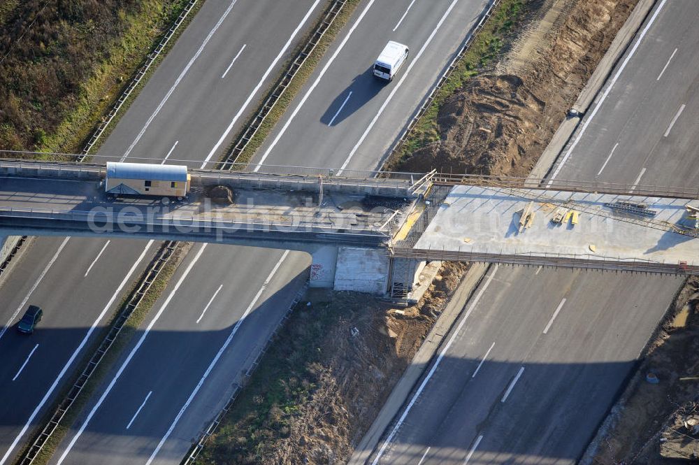 Aerial image SCHWANEBECK - Baustelle vom Autobahndreieck Kreuz Barnim, vormals AD Schwanebeck, mit Aus- und Umbauarbeiten. Die EUROVIA führt im Auftrag des Landesbetrieb Brandenburg umfangreiche Abbruch-, Erdarbeiten und den Neubau von Brückenbauwerken zum Um- und Ausbau des Autobahndreiecks (AD) Barnim am nördlichen Berliner Ring durch. View of the construction site at the highway triangle Kreuz Barnim.