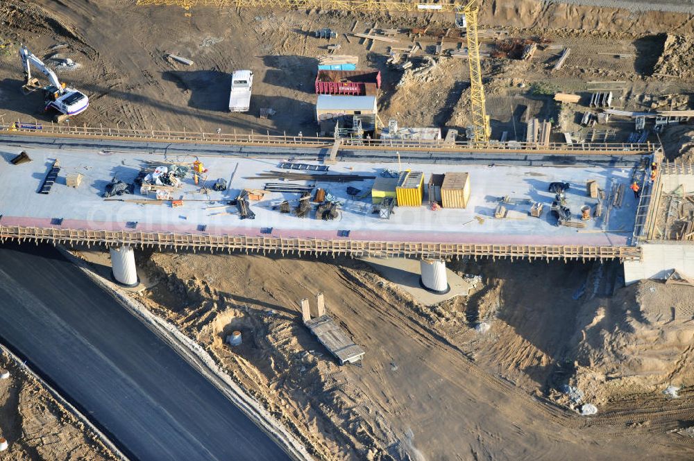 Aerial photograph SCHWANEBECK - Baustelle vom Autobahndreieck Kreuz Barnim, vormals AD Schwanebeck, mit Aus- und Umbauarbeiten. Die EUROVIA führt im Auftrag des Landesbetrieb Brandenburg umfangreiche Abbruch-, Erdarbeiten und den Neubau von Brückenbauwerken zum Um- und Ausbau des Autobahndreiecks (AD) Barnim am nördlichen Berliner Ring durch. View of the construction site at the highway triangle Kreuz Barnim.