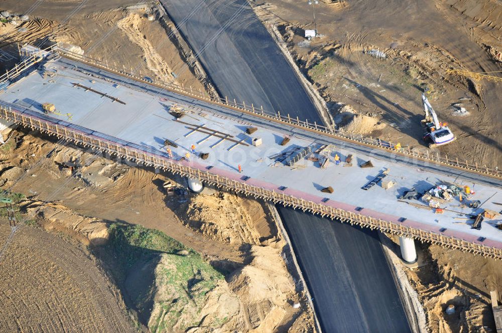 SCHWANEBECK from above - Baustelle vom Autobahndreieck Kreuz Barnim, vormals AD Schwanebeck, mit Aus- und Umbauarbeiten. Die EUROVIA führt im Auftrag des Landesbetrieb Brandenburg umfangreiche Abbruch-, Erdarbeiten und den Neubau von Brückenbauwerken zum Um- und Ausbau des Autobahndreiecks (AD) Barnim am nördlichen Berliner Ring durch. View of the construction site at the highway triangle Kreuz Barnim.