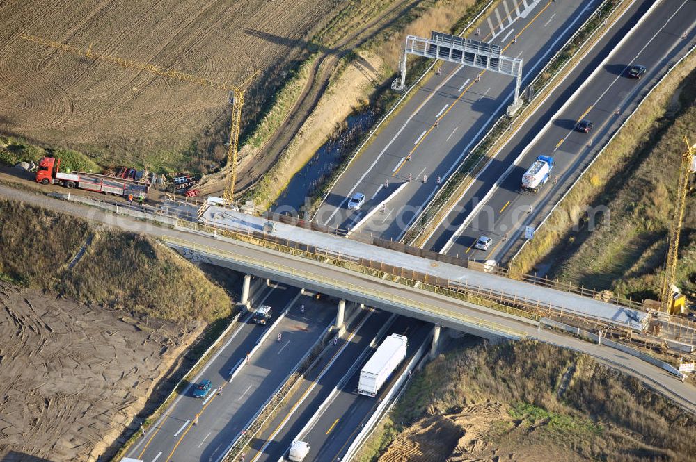 SCHWANEBECK from the bird's eye view: Baustelle vom Autobahndreieck Kreuz Barnim, vormals AD Schwanebeck, mit Aus- und Umbauarbeiten. Die EUROVIA führt im Auftrag des Landesbetrieb Brandenburg umfangreiche Abbruch-, Erdarbeiten und den Neubau von Brückenbauwerken zum Um- und Ausbau des Autobahndreiecks (AD) Barnim am nördlichen Berliner Ring durch. View of the construction site at the highway triangle Kreuz Barnim.