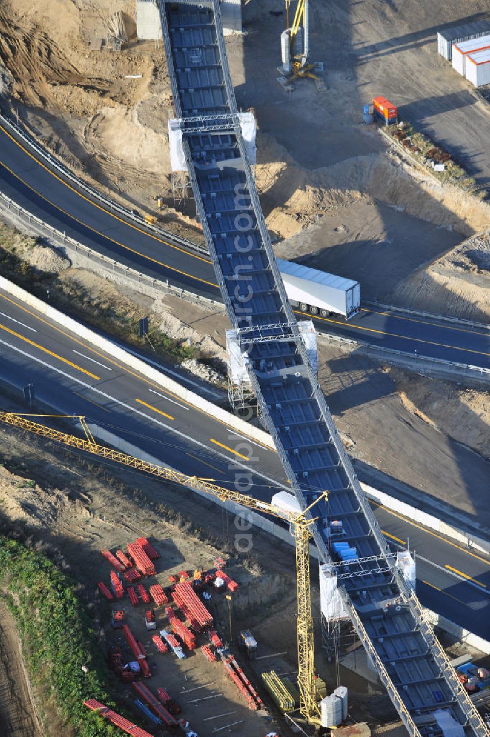 SCHWANEBECK from the bird's eye view: Baustelle vom Autobahndreieck Kreuz Barnim, vormals AD Schwanebeck, mit Aus- und Umbauarbeiten. Die EUROVIA führt im Auftrag des Landesbetrieb Brandenburg umfangreiche Abbruch-, Erdarbeiten und den Neubau von Brückenbauwerken zum Um- und Ausbau des Autobahndreiecks (AD) Barnim am nördlichen Berliner Ring durch. View of the construction site at the highway triangle Kreuz Barnim.