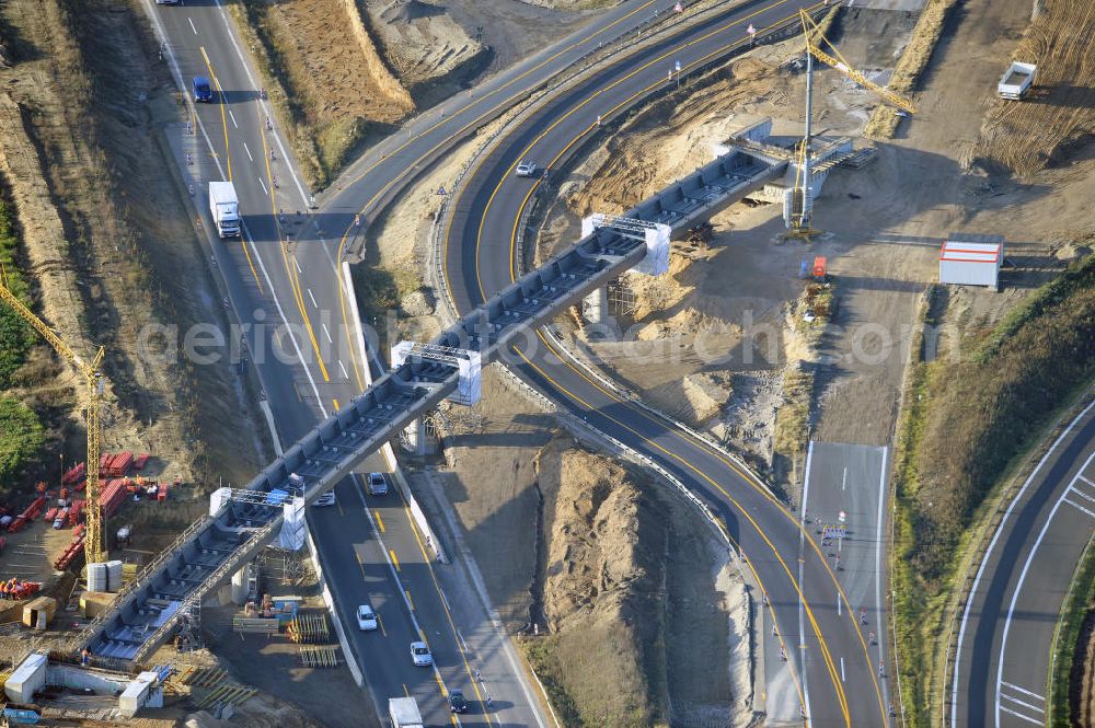 Aerial photograph SCHWANEBECK - Baustelle vom Autobahndreieck Kreuz Barnim, vormals AD Schwanebeck, mit Aus- und Umbauarbeiten. Die EUROVIA führt im Auftrag des Landesbetrieb Brandenburg umfangreiche Abbruch-, Erdarbeiten und den Neubau von Brückenbauwerken zum Um- und Ausbau des Autobahndreiecks (AD) Barnim am nördlichen Berliner Ring durch. View of the construction site at the highway triangle Kreuz Barnim.