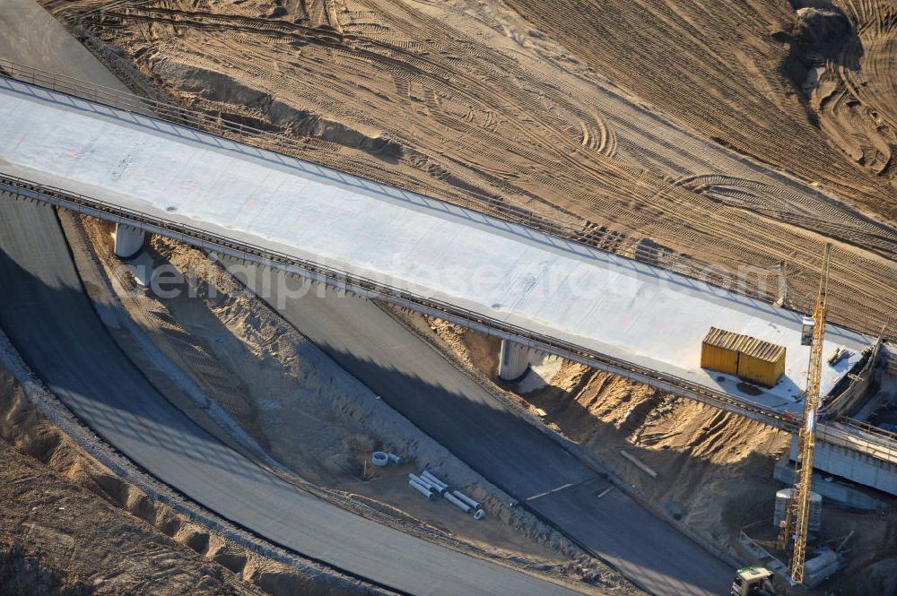 Aerial image SCHWANEBECK - Baustelle vom Autobahndreieck Kreuz Barnim, vormals AD Schwanebeck, mit Aus- und Umbauarbeiten. Die EUROVIA führt im Auftrag des Landesbetrieb Brandenburg umfangreiche Abbruch-, Erdarbeiten und den Neubau von Brückenbauwerken zum Um- und Ausbau des Autobahndreiecks (AD) Barnim am nördlichen Berliner Ring durch. View of the construction site at the highway triangle Kreuz Barnim.