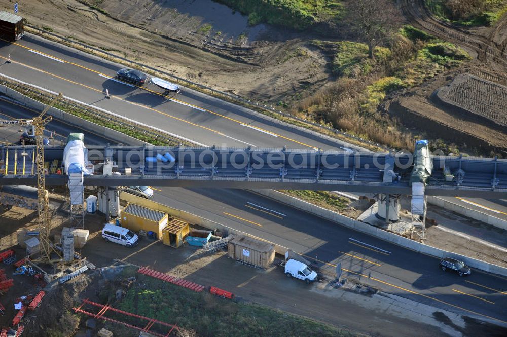 SCHWANEBECK from the bird's eye view: Baustelle vom Autobahndreieck Kreuz Barnim, vormals AD Schwanebeck, mit Aus- und Umbauarbeiten. Die EUROVIA führt im Auftrag des Landesbetrieb Brandenburg umfangreiche Abbruch-, Erdarbeiten und den Neubau von Brückenbauwerken zum Um- und Ausbau des Autobahndreiecks (AD) Barnim am nördlichen Berliner Ring durch. View of the construction site at the highway triangle Kreuz Barnim.