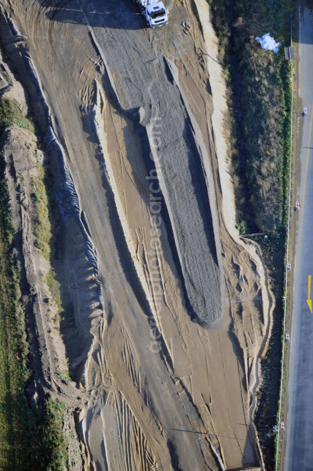 SCHWANEBECK from above - Baustelle vom Autobahndreieck Kreuz Barnim, vormals AD Schwanebeck, mit Aus- und Umbauarbeiten. Die EUROVIA führt im Auftrag des Landesbetrieb Brandenburg umfangreiche Abbruch-, Erdarbeiten und den Neubau von Brückenbauwerken zum Um- und Ausbau des Autobahndreiecks (AD) Barnim am nördlichen Berliner Ring durch. View of the construction site at the highway triangle Kreuz Barnim.