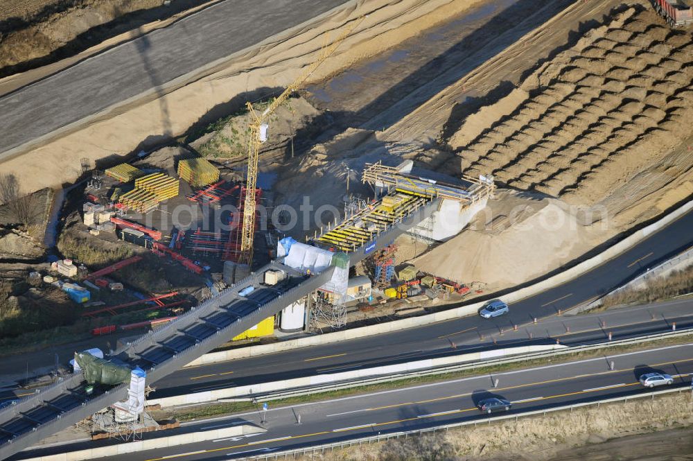 SCHWANEBECK from the bird's eye view: Baustelle vom Autobahndreieck Kreuz Barnim, vormals AD Schwanebeck, mit Aus- und Umbauarbeiten. Die EUROVIA führt im Auftrag des Landesbetrieb Brandenburg umfangreiche Abbruch-, Erdarbeiten und den Neubau von Brückenbauwerken zum Um- und Ausbau des Autobahndreiecks (AD) Barnim am nördlichen Berliner Ring durch. View of the construction site at the highway triangle Kreuz Barnim.