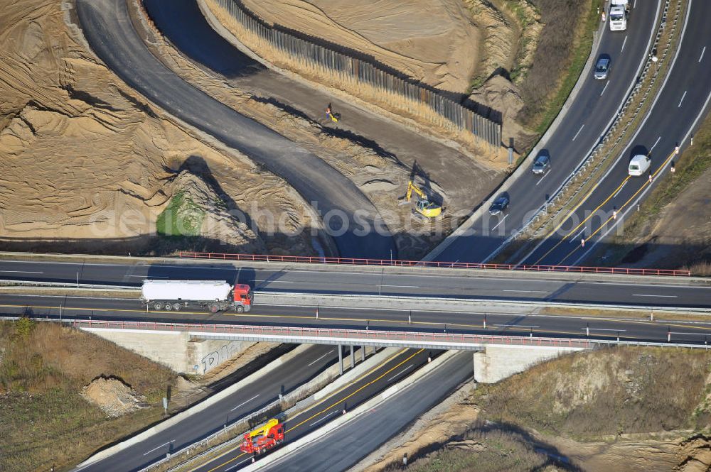 SCHWANEBECK from the bird's eye view: Baustelle vom Autobahndreieck Kreuz Barnim, vormals AD Schwanebeck, mit Aus- und Umbauarbeiten. Die EUROVIA führt im Auftrag des Landesbetrieb Brandenburg umfangreiche Abbruch-, Erdarbeiten und den Neubau von Brückenbauwerken zum Um- und Ausbau des Autobahndreiecks (AD) Barnim am nördlichen Berliner Ring durch. View of the construction site at the highway triangle Kreuz Barnim.