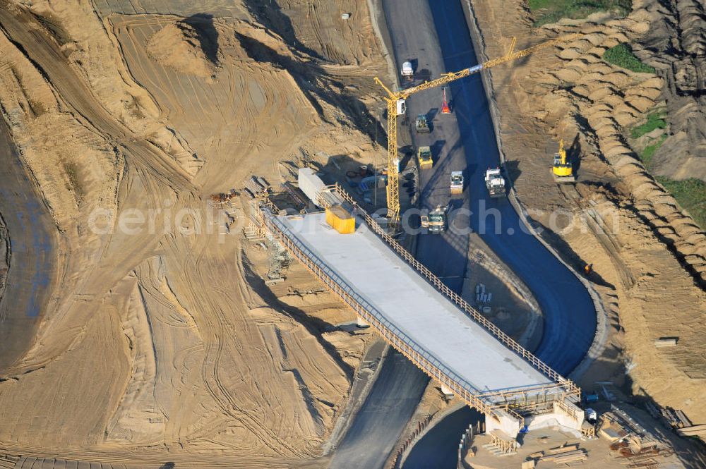 Aerial image SCHWANEBECK - Baustelle vom Autobahndreieck Kreuz Barnim, vormals AD Schwanebeck, mit Aus- und Umbauarbeiten. Die EUROVIA führt im Auftrag des Landesbetrieb Brandenburg umfangreiche Abbruch-, Erdarbeiten und den Neubau von Brückenbauwerken zum Um- und Ausbau des Autobahndreiecks (AD) Barnim am nördlichen Berliner Ring durch. View of the construction site at the highway triangle Kreuz Barnim.