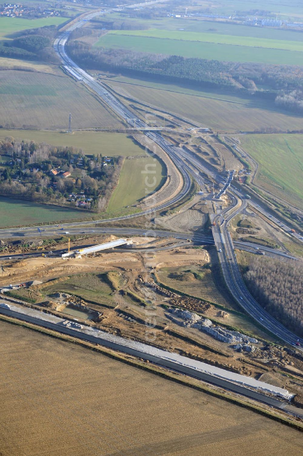 SCHWANEBECK from the bird's eye view: Baustelle vom Autobahndreieck Kreuz Barnim, vormals AD Schwanebeck, mit Aus- und Umbauarbeiten. Die EUROVIA führt im Auftrag des Landesbetrieb Brandenburg umfangreiche Abbruch-, Erdarbeiten und den Neubau von Brückenbauwerken zum Um- und Ausbau des Autobahndreiecks (AD) Barnim am nördlichen Berliner Ring durch. View of the construction site at the highway triangle Kreuz Barnim.