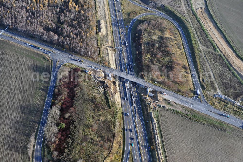 SCHWANEBECK from above - Baustelle vom Autobahndreieck Kreuz Barnim, vormals AD Schwanebeck, mit Aus- und Umbauarbeiten. Die EUROVIA führt im Auftrag des Landesbetrieb Brandenburg umfangreiche Abbruch-, Erdarbeiten und den Neubau von Brückenbauwerken zum Um- und Ausbau des Autobahndreiecks (AD) Barnim am nördlichen Berliner Ring durch. View of the construction site at the highway triangle Kreuz Barnim.